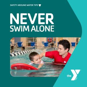Kid swimming with a swim instructor.
