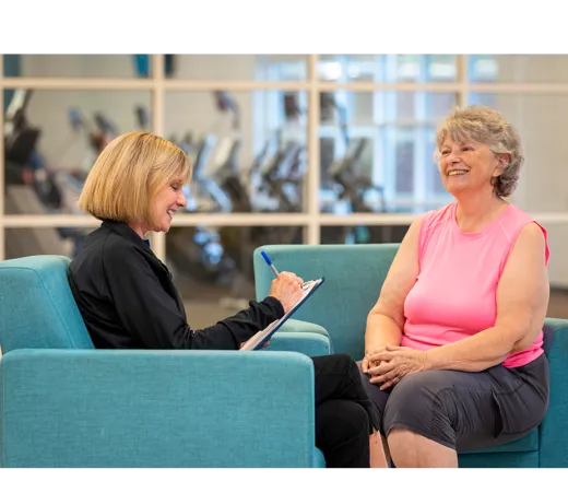 Membership staff working with a member to define wellness goals.