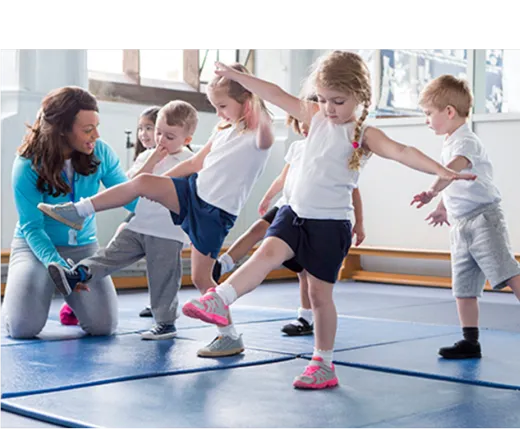 kids walking and playing on a mat
