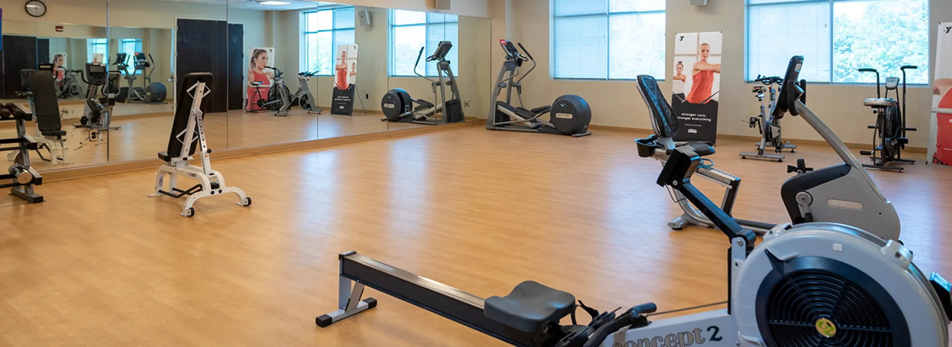Room with cardio and strength equipment