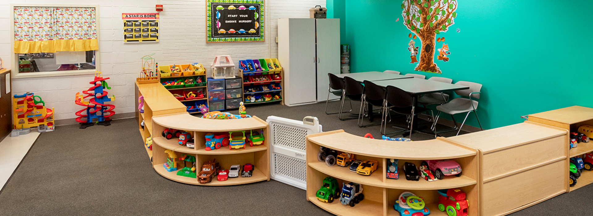 Child Watch area with toys for kids to play with